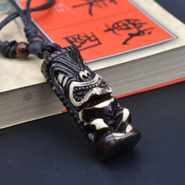 Collier tiki homme