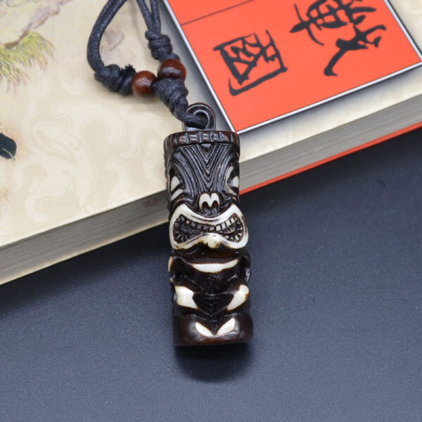 Collier tiki homme